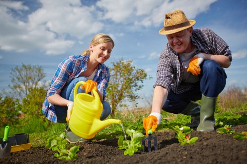 Team using protective equipment during gardening work